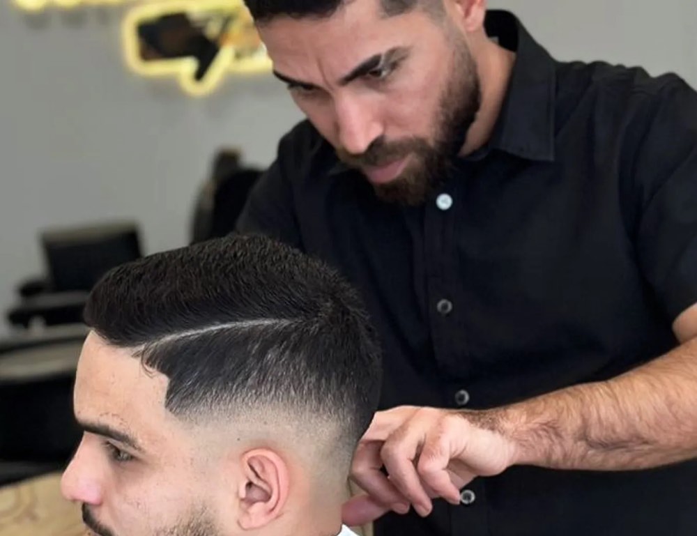 Dégradé homme réalisé chez Signature Élégance Coiffure